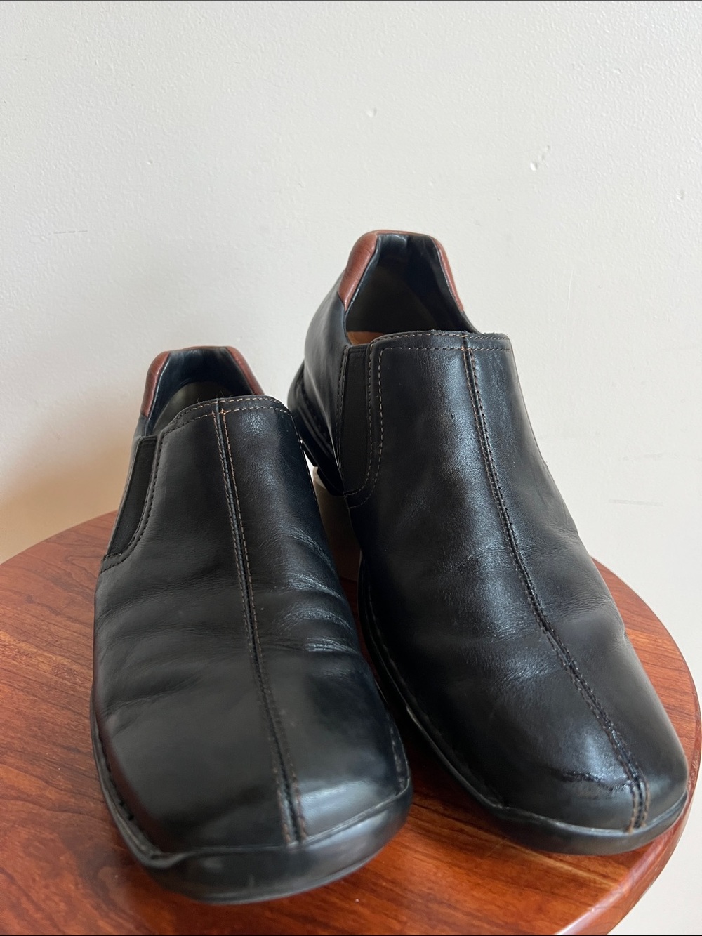 Cole Haan Black Leather Slip-On Loafers with Brown Heel Detail